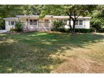 Ranch home with large yard and deck at 4770 Shady Rest Dr, Powder Springs, GA 30127