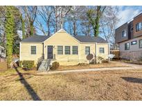 Cute ranch home with a yard, satellite dish and mature trees at 1368 Wichita Sw Dr, Atlanta, GA 30311