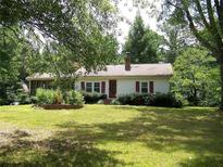 Charming one-story home with a spacious yard and mature trees at 4038 Wesley Chapel Rd, Marietta, GA 30062