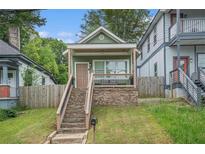 Charming craftsman home with stone steps and a covered porch at 490 Rockwell Sw St, Atlanta, GA 30310