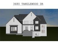 Stunning two-story home with modern farmhouse exterior and large backyard at 3680 Tanglewood Se Dr, Atlanta, GA 30339