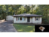 Ranch home with detached shed and yard at 410 Picketts Mill Rd, Dallas, GA 30157