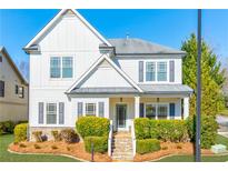 Two-story house with gray accents and landscaped yard at 970 Samples Nw Ln, Atlanta, GA 30318