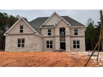 Two-story house with brick facade and large windows at 4830 Cool Springs Rd, Winston, GA 30187