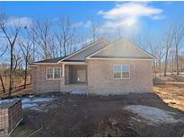 Brick house with front porch and landscaping at 3383 Milan Ct, Douglasville, GA 30135