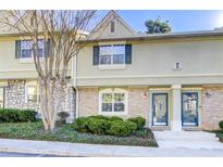 Attractive exterior of townhome with landscaping at 6900 Roswell Rd # 3B, Atlanta, GA 30328