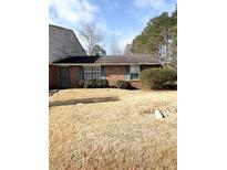 Brick ranch home with a small yard at 6354 Shannon Pkwy # 27D, Union City, GA 30291