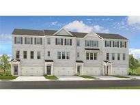 Three-story townhouses with gray brick, garages, and front landscaping at 213 Maycrest Path, Tucker, GA 30084