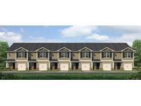 Exterior of townhome community featuring six attached units with garages at 2094 Moss Hill Road, Stone Mountain, GA 30088