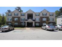 Attractive apartment building with ample parking at 6101 Waldrop Pl, Decatur, GA 30034