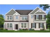 Two-story house with gray siding, dark shutters, and a grassy lawn at 189 Haverling Pass, Hampton, GA 30228