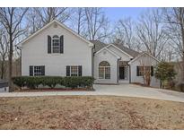 Charming white brick home with a well-manicured front yard and a classic architectural design at 366 Greycoat Sw Blf, Marietta, GA 30064