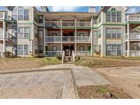 Exterior of a multi-story building with multiple balconies and parking at 3488 Shepherds Path, Decatur, GA 30034