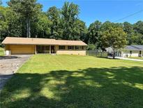 Ranch house with attached garage and large yard at 2245 Union Rd, Atlanta, GA 30331