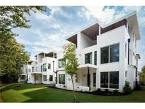 Modern white townhouses with landscaped lawn at 98 Whitefoord Ne Ave # A, Atlanta, GA 30307
