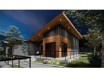 Striking modern home featuring wood and metal facade, plus outdoor space at 6305 Shannon Pkwy # 204, Union City, GA 30291