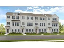Three-story townhouses with brick exteriors and front yards at 214 Maycrest Path, Tucker, GA 30084