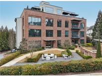 Brick building with courtyard and walkway at 230 Vickery Falls Dr, Roswell, GA 30075