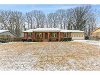 Brick ranch house with a spacious yard, perfect for Gathering living at 763 Windy Sw Dr, Stone Mountain, GA 30087