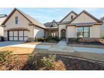 Craftsman style home with stone accents and a 3-car garage at 4983 Kyle Dr, Powder Springs, GA 30127