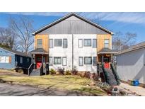 Modern duplex with neutral siding and a landscaped front yard offers inviting curb appeal at 160 Vanira Se Ave # A, Atlanta, GA 30315