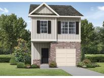 Charming two-story home with a brick facade, a single-car garage, and manicured landscaping at 2816 Lillian Ln, Douglasville, GA 30135