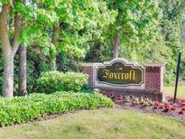 Bright condo entryway with wood floors and a view of the living room at 6851 Roswell Rd # N-20, Sandy Springs, GA 30328