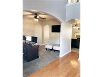 Home office with wood desk, two monitors, and comfy seating at 500 Gristmill Ln, Hampton, GA 30228