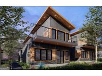 Modern two-story home with gray exterior and wood accents at 6305 Shannon Pkwy # 202, Union City, GA 30291