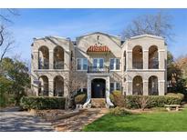 Attractive 3-story building with Spanish-style architecture and balconies at 856 Briarcliff Ne Rd # 25, Atlanta, GA 30306