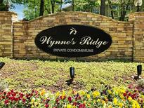 Wynne's Ridge Private Condominiums sign with stone and landscaping at 1507 Wynnes Ridge Se Cir, Marietta, GA 30067