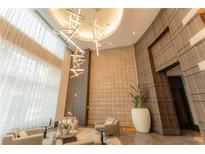 Elegant lobby with modern seating and large windows at 1080 Peachtree Ne St # 2710, Atlanta, GA 30309