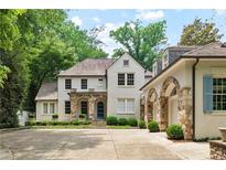 Stunning two-story home with brick facade and landscaped grounds at 2522 Habersham Nw Rd, Atlanta, GA 30305