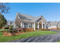 Ranch style home with brick accents and a covered porch at 2614 Grapevine Cir, Cumming, GA 30041