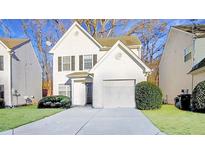 Two-story house with attached garage and well-maintained lawn at 268 Springbottom Dr, Lawrenceville, GA 30046