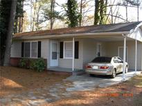 Cozy ranch home with carport and mature trees at 2820 Argyle Nw Dr, Atlanta, GA 30318