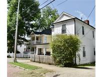 Charming historic homes with varied facades and fenced yards line a peaceful street at 531 Connally St, Atlanta, GA 30312