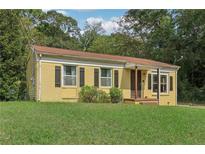 Ranch style brick home with a large front yard at 1144 Kipling Se St, Atlanta, GA 30315