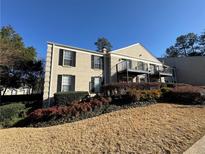 Attractive brick building with balconies and landscaping at 3468 Essex Ave, Atlanta, GA 30339