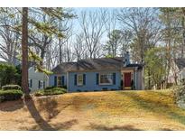 Charming blue house with a well-manicured lawn at 1949 Westminster Ne Way, Atlanta, GA 30307