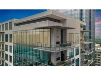 Modern condo building with glass balconies and city views at 40 12Th Ne St # 1903, Atlanta, GA 30309