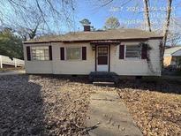 Ranch style home with a spacious yard at 5039 East St, Forest Park, GA 30297