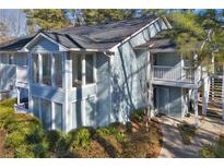 Charming two-story condo with a sunroom and private balcony at 1647 Raleigh Se Cir, Marietta, GA 30067
