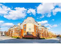 Modern apartment building with brick and yellow siding, offering city views at 400 17Th Nw St # 2118, Atlanta, GA 30363