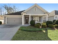 Gray siding two-car garage charming craftsman style home at 2071 Imperial Pond, Powder Springs, GA 30127