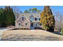 Charming single-Gathering home with manicured lawn and mature trees in a quiet neighborhood at 4760 Green Summers Dr, Cumming, GA 30028