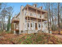 Exterior view of a house featuring balconies and wooden frame at 3160 Hathaway Ct, Atlanta, GA 30341