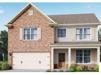Two-story brick home with a beige second floor and a double-car garage at 490 Paces Dr, Lithia Springs, GA 30122