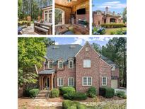 Brick house with landscaped yard, stone steps, and a two-car garage at 4545 Whitestone Way, Suwanee, GA 30024