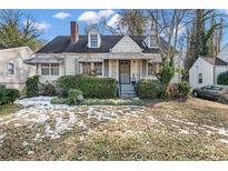 Charming one-story home with a spacious front yard at 1142 Cahaba Dr, Atlanta, GA 30311